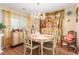 Bright dining area with an elegant chandelier, perfect for Gathering meals at 7873 Park Gate Dr, North Charleston, SC 29418