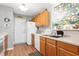 Well-lit kitchen with laminate countertops, offering a practical cooking area at 7873 Park Gate Dr, North Charleston, SC 29418