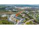 An aerial view of townhomes by a marsh with waterways, green landscaping, and a community pool at 806 Kings Oak Court Ct # 7, Charleston, SC 29492