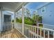 Balcony showcasing palm trees, wooded views, and blue skies at 806 Kings Oak Court Ct # 7, Charleston, SC 29492