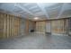Unfinished basement with exposed framing and concrete floor, offering plenty of potential for customization at 806 Kings Oak Court Ct # 7, Charleston, SC 29492