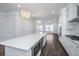 Beautiful kitchen featuring a large island, stainless steel appliances, and modern pendant lighting at 806 Kings Oak Court Ct # 7, Charleston, SC 29492