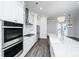 Bright kitchen featuring stainless steel appliances, a gas cooktop, and modern pendant lighting at 806 Kings Oak Court Ct # 7, Charleston, SC 29492