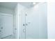 A frameless glass enclosed shower features white subway tile, a rainfall shower head and built-in niche at 806 Kings Oak Court Ct # 7, Charleston, SC 29492