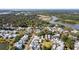 Beautiful aerial view of community near a lake, with well-maintained homes and lush green spaces in a tranquil setting at 8067 Jack Island Dr, Johns Island, SC 29455