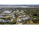 Community aerial view showcases a picturesque setting with waterfront views, mature trees, and well-manicured lawns at 8067 Jack Island Dr, Johns Island, SC 29455