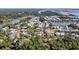Expansive aerial view of the community nestled amidst mature trees and waterfronts creating a serene and private setting at 8067 Jack Island Dr, Johns Island, SC 29455