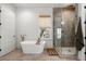 Modern bathroom with large soaking tub and glass shower at 8067 Jack Island Dr, Johns Island, SC 29455