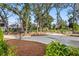 Inviting driveway with lush landscaping creating curb appeal for this lovely home in a desirable location at 8067 Jack Island Dr, Johns Island, SC 29455