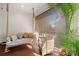 Cozy screened-in porch with seating, side table, and decorative accents with an exterior view at 8067 Jack Island Dr, Johns Island, SC 29455