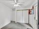 Bedroom featuring carpet flooring, a ceiling fan, and sliding-door closet at 8219 Quail Hollow Ct, North Charleston, SC 29420