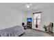 Bedroom featuring a ceiling fan, a window with decorative curtains, and carpet flooring at 8219 Quail Hollow Ct, North Charleston, SC 29420