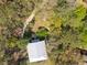 Aerial view of the house and the treed community at 8551 Pope Landing Rd, Edisto Island, SC 29438