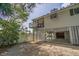Exterior view of a charming coastal home with a lift, garage, and white picket fence at 8551 Pope Landing Rd, Edisto Island, SC 29438