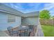 Outdoor wooden deck featuring patio furniture and a beautiful view of the green backyard at 9156 Fieldstone Trce, Summerville, SC 29485