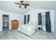 Spacious bedroom with wood floors, ensuite bathroom, and large windows at 9156 Fieldstone Trce, Summerville, SC 29485