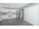 Bright kitchen features white cabinets, stainless steel appliances, and tile floors at 9156 Fieldstone Trce, Summerville, SC 29485