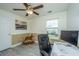 Bright office space featuring a classic rocking horse, a modern computer setup, and a ceiling fan at 9156 Fieldstone Trce, Summerville, SC 29485