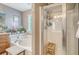 Well-lit bathroom with a soaking tub, separate shower, and vanity with drawers and double sinks at 9316 Sweetbay Ct, Ladson, SC 29456