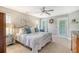 Bedroom with a comfortable bed, neutral carpet, and a bright ambiance from natural light at 9316 Sweetbay Ct, Ladson, SC 29456
