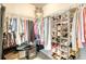 Walk-in closet with ample storage space for clothing, shoes, and personal items at 9316 Sweetbay Ct, Ladson, SC 29456