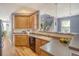 Stylish kitchen with wooden cabinets, granite countertops, stainless steel appliances, and an inviting atmosphere at 9316 Sweetbay Ct, Ladson, SC 29456