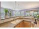 Kitchen with breakfast bar open to an eating area and living room at 9316 Sweetbay Ct, Ladson, SC 29456