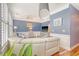 Relaxing living room featuring comfortable seating, hardwood floors, and ample lighting and decor at 9316 Sweetbay Ct, Ladson, SC 29456