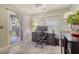 Bright office with work station, rug, sliding glass doors, and natural light at 9316 Sweetbay Ct, Ladson, SC 29456