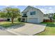 Charming two-story home with white siding, turquoise shutters, and a well-manicured lawn at 1005 Golden Aspen Dr, Moncks Corner, SC 29461