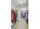 Walk-in closet with ample storage space for clothes and accessories at 1005 Golden Aspen Dr, Moncks Corner, SC 29461