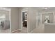 Upstairs hallway featuring laundry area and bathroom entrance at 1019 Victoria Pointe Ln, Summerville, SC 29485