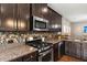 Well-equipped kitchen with granite countertops and stainless steel appliances at 1019 Victoria Pointe Ln, Summerville, SC 29485