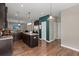 Spacious kitchen with a view into the living room, stainless steel appliances, and an island at 1019 Victoria Pointe Ln, Summerville, SC 29485