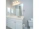Bathroom featuring a white vanity, a large mirror, with updated fixtures, and a toilet with white tissue at 1025 Riverland Woods Pl # 901, Charleston, SC 29412