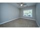 Bedroom featuring plush carpet, ceiling fan, and a window that offers natural light at 1025 Riverland Woods Pl # 901, Charleston, SC 29412