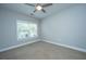 Bedroom with neutral carpet, ceiling fan and window at 1025 Riverland Woods Pl # 901, Charleston, SC 29412