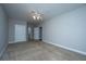 Bedroom with neutral carpet, ceiling fan and view of a bathroom at 1025 Riverland Woods Pl # 901, Charleston, SC 29412