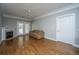 Inviting living room with fireplace, hardwood floors, and glass doors leading to the outside at 1025 Riverland Woods Pl # 901, Charleston, SC 29412