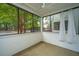 Enclosed patio with screened windows and ceiling fan offering a relaxing outdoor space and natural light at 1025 Riverland Woods Pl # 901, Charleston, SC 29412