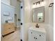 Well-lit bathroom with a modern vanity, stylish mirror, and tasteful decor at 1027 Island View Ct, Charleston, SC 29492
