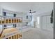 Spacious bedroom with a bunk bed and view to the bathroom and closet at 1027 Island View Ct, Charleston, SC 29492