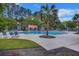 Large community pool area with ample seating, mature trees, and a relaxing resort-like atmosphere at 1027 Island View Ct, Charleston, SC 29492