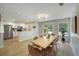 Bright and airy dining area connecting the kitchen and living spaces, perfect for Gathering meals and gatherings at 1027 Island View Ct, Charleston, SC 29492