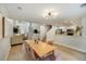 Spacious living area with dining area and open staircase to the upper level at 1027 Island View Ct, Charleston, SC 29492