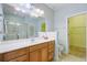 Bathroom with vanity and a separate shower cabin and open walk-in closet at 108 Gaslight Blvd, Summerville, SC 29483