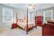 Bedroom with great natural light, neutral carpet and floors, and a four poster bed at 108 Gaslight Blvd, Summerville, SC 29483