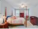 A spacious bedroom with four poster bed, comfortable carpet, and ample natural light at 108 Gaslight Blvd, Summerville, SC 29483