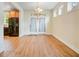 Bright dining area with hardwood floors, white trim, and elegant lighting fixture at 108 Gaslight Blvd, Summerville, SC 29483