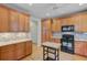 Bright kitchen with light wood cabinets, tile backsplash, and modern appliances offers style and functionality at 108 Gaslight Blvd, Summerville, SC 29483